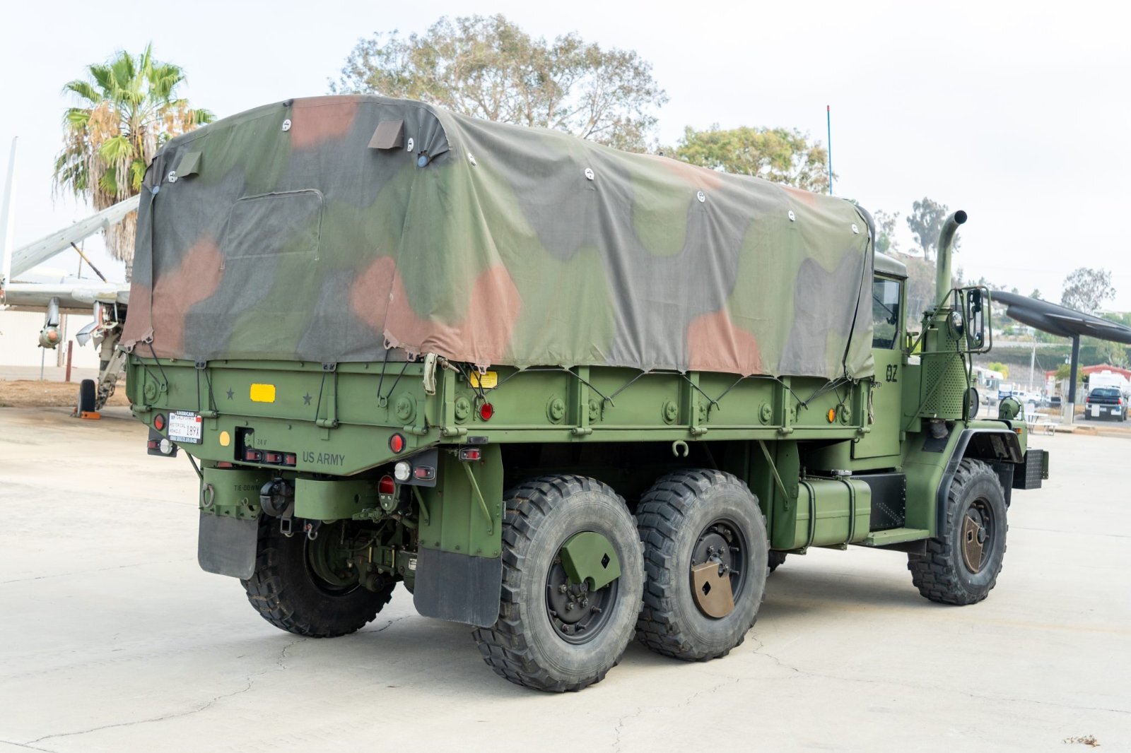 Rear three-quarter view of modified AM General M35A3 military truck